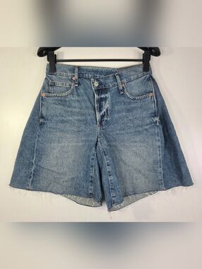 FREE PEOPLE WE THE FREE BOOMERANG  ASYMMETRICAL WAIST DENIM SHORTS.